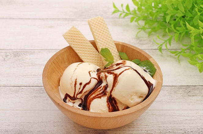 2479472845 Vanilla ice cream with chocolate sauce