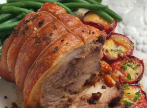 Slow-Roasted Pork with Thyme, Garlic and Plums. Selective Focus