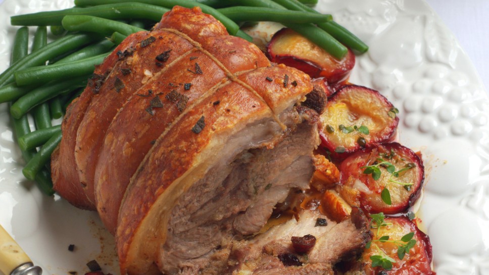 Slow-Roasted Pork with Thyme, Garlic and Plums. Selective Focus