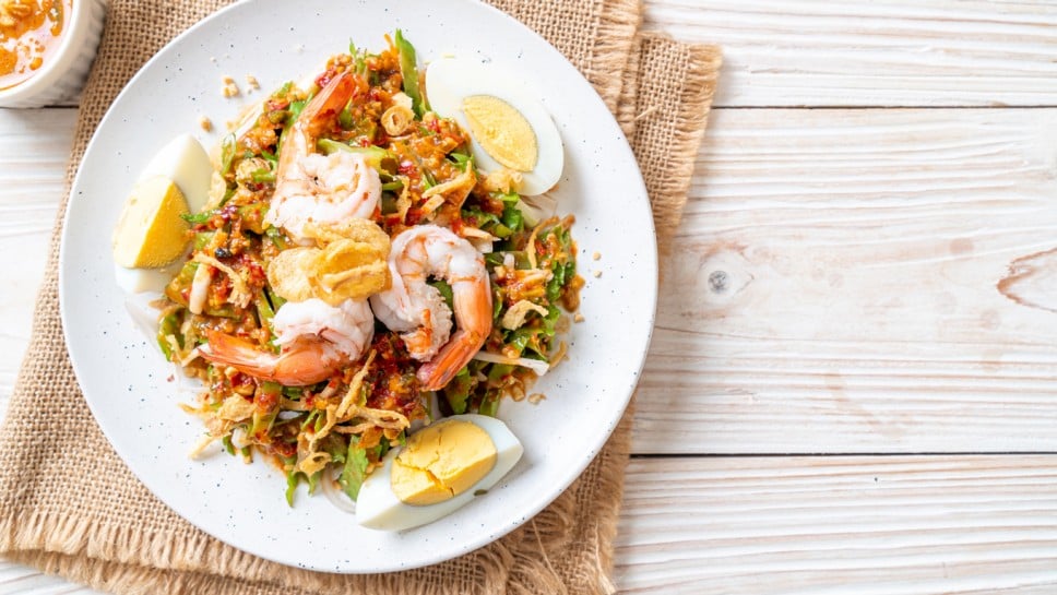 Wing Bean or Betel Nuts Spicy Salad with Prawns and Shrimps - Thai food style