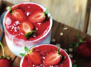 Selective focus. Chia yogurt with strawberry topping. Healthy summer dessert with strawberries. Keto dessert.