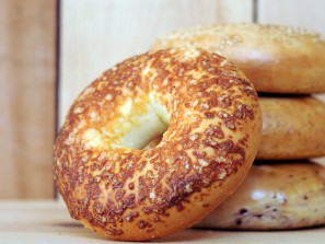  bagels on wooden table at market place 