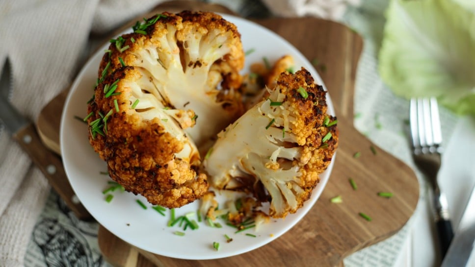 Baked cauliflower with turmeric. Delicious cauliflower. The perfect tasty snack. It tastes delicious with meat.