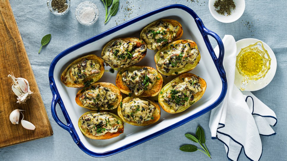 vegan baked potatoes with mushrooms in bechamel sauce with soy milk. healthy lunch or dinner for the family