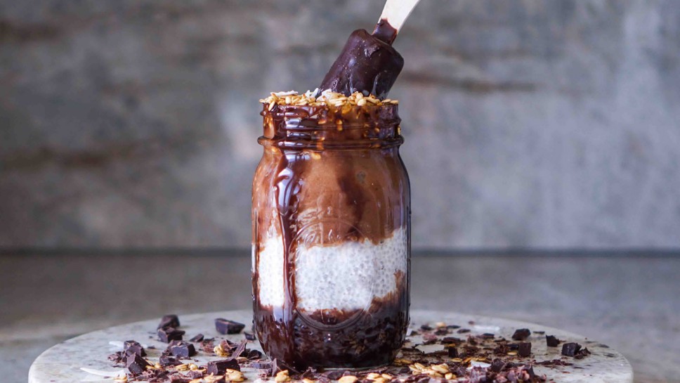 Chocolate Chia Pudding, Smoothie with Granola and Coconut. Selective Focus, Toning.
