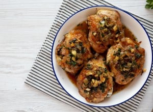 Homemade Garlic Brown Sugar Chicken in a Pan, top view. Overhead, from above, flat lay. Copy space.