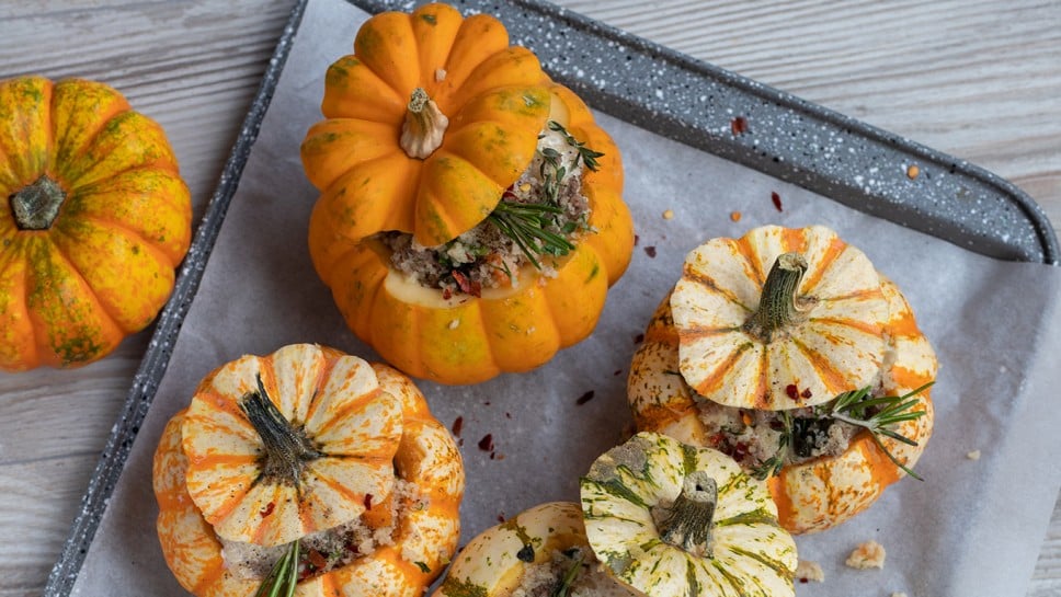 A Group of Mini Pumpkins stuffed with meat and mushrooms in bechamel sauce.