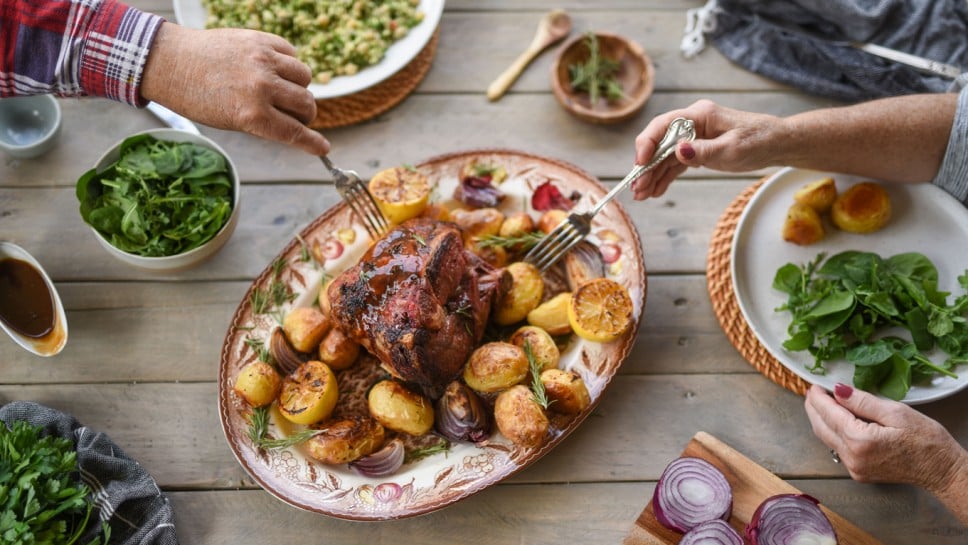 Roast Lamb Leg with Rosemary and Garlic served with baked potatoes