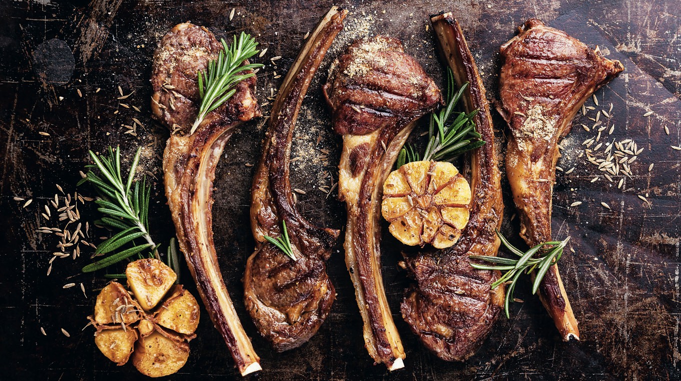 243754222 Roasted lamb ribs with spices and garlic on dark steel background; Shutterstock ID 243754222; purchase_order: Nisa; job: BBQ 2022.; client: Spar Hrvatska; other: