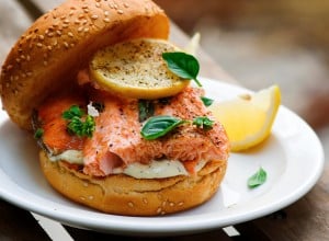 Fish burger with herb and lemon sauce.selective focus