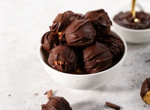 Homemade peanut butter truffle balls covered in chocolate, selective focus