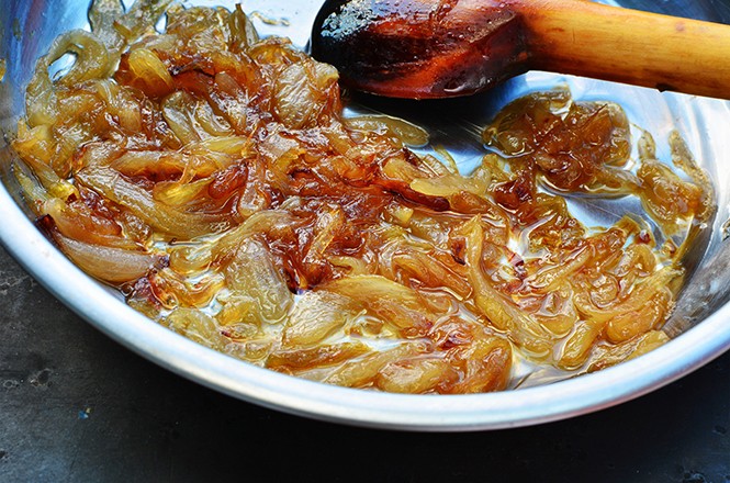 Caramelized onions in frying pan.