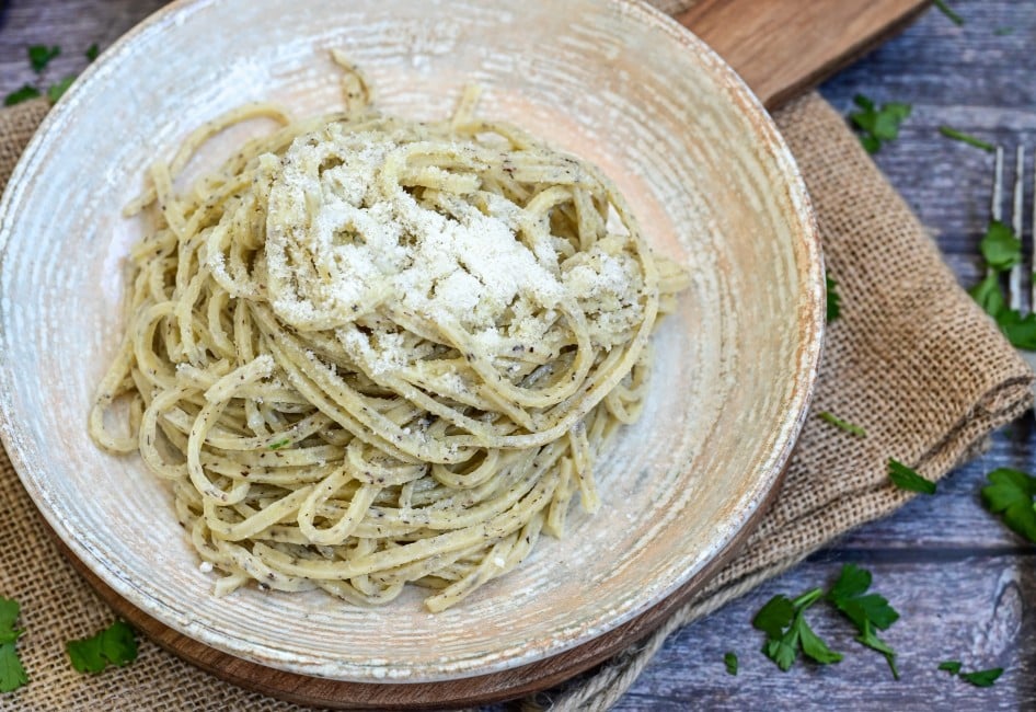 Black Truffle sauce fresh tagliolini noodle pasta, original italian food fresh egg pasta, cream sauce  and fresh herbs.Spaghetti with fresh black truffle and cream sauce