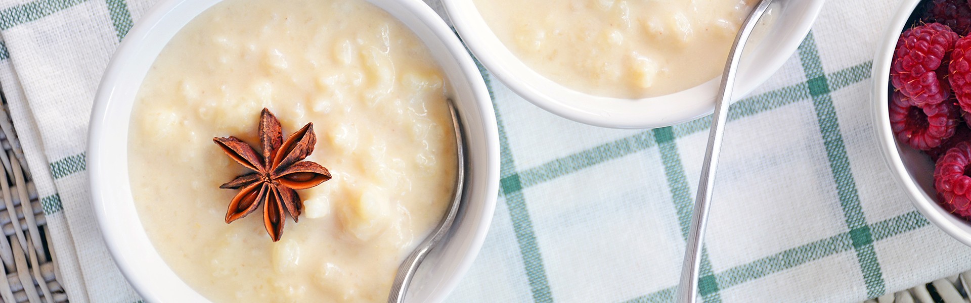 Fresh creamy home made rice pudding shot from overhead in natural light