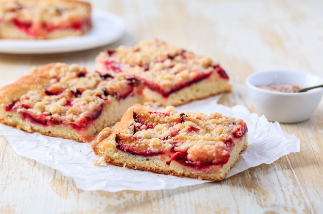 German plum cake (Zwetschgenkuchen) with  yeast dough and crumbles